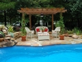 Swimming Pool with Pergola and Living Area